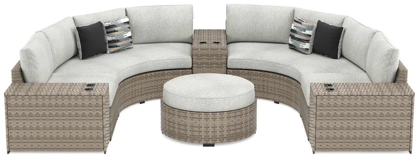 Calworth 7-Piece Outdoor Sectional with Ottoman image